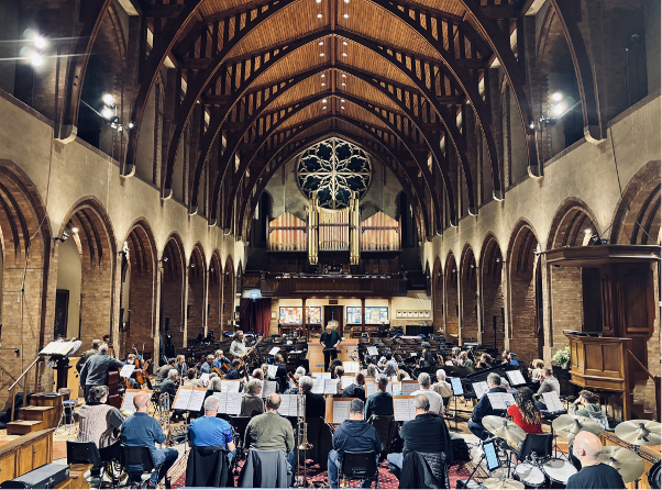 The band and orchestra during rehearsals for the shows