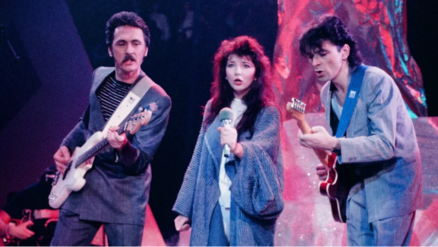 Kevin (right) performing Running Up That Hill with Kate and Del Palmer on German television