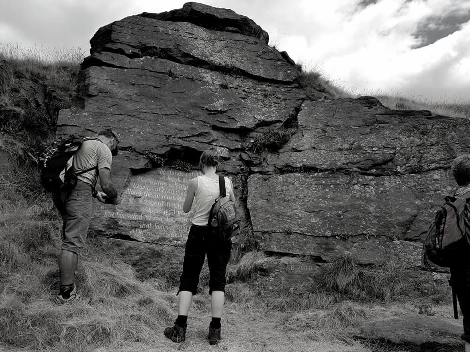 Hikers admire Kate's Bronte Stone
