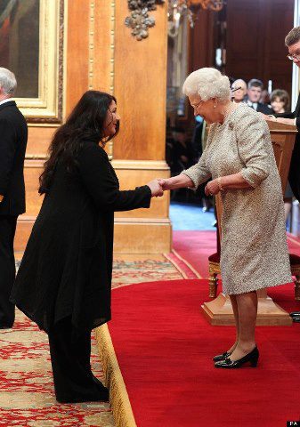 Kate receives her CBE from the Queen