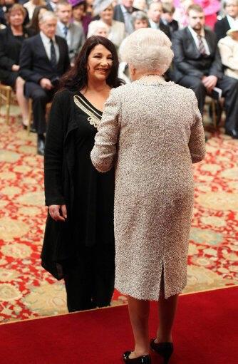 Kate receives her CBE from the Queen